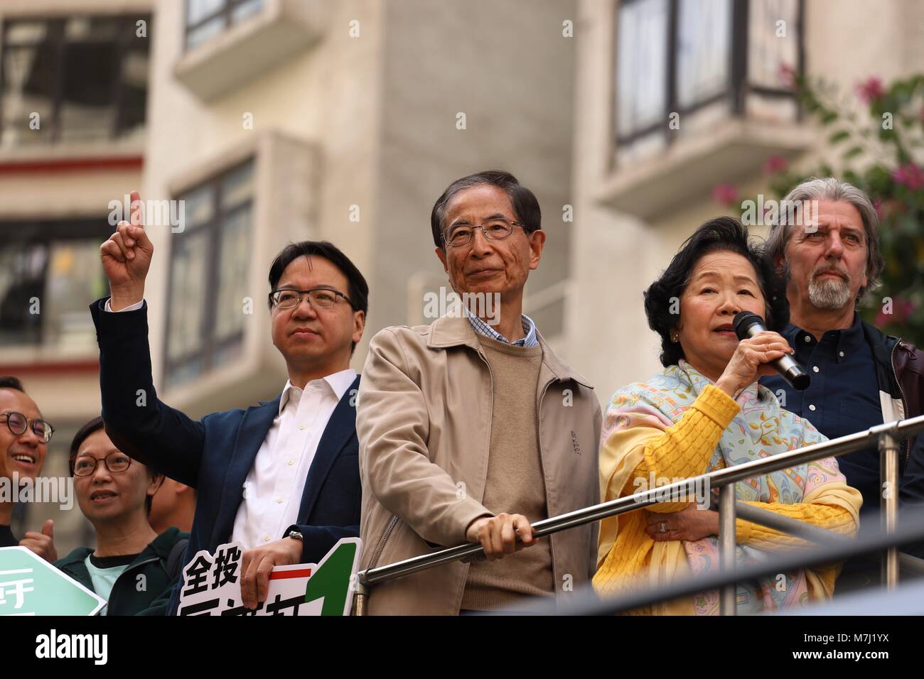 Hong Kong, CHINA. 11th Mar, 2018. Founder and former Chairman of the DEMOCRATIC PARTY, Martin Lee ( C ) show up to support Democratic Party Candidate No.1 Au Kok-hin on the voting date during LEGICO By-Election campaign. Mar-11, 2018.Hong Kong.ZUMA/Liau Chung Ren Credit: Liau Chung Ren/ZUMA Wire/Alamy Live News Stock Photo