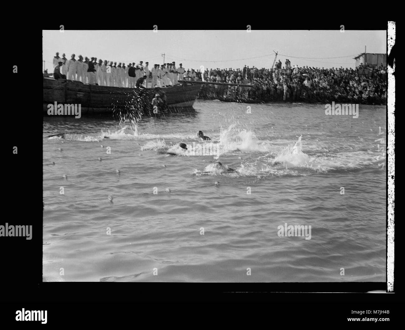 A photograph of a celebration taking place at the Tel Aviv jetty ...