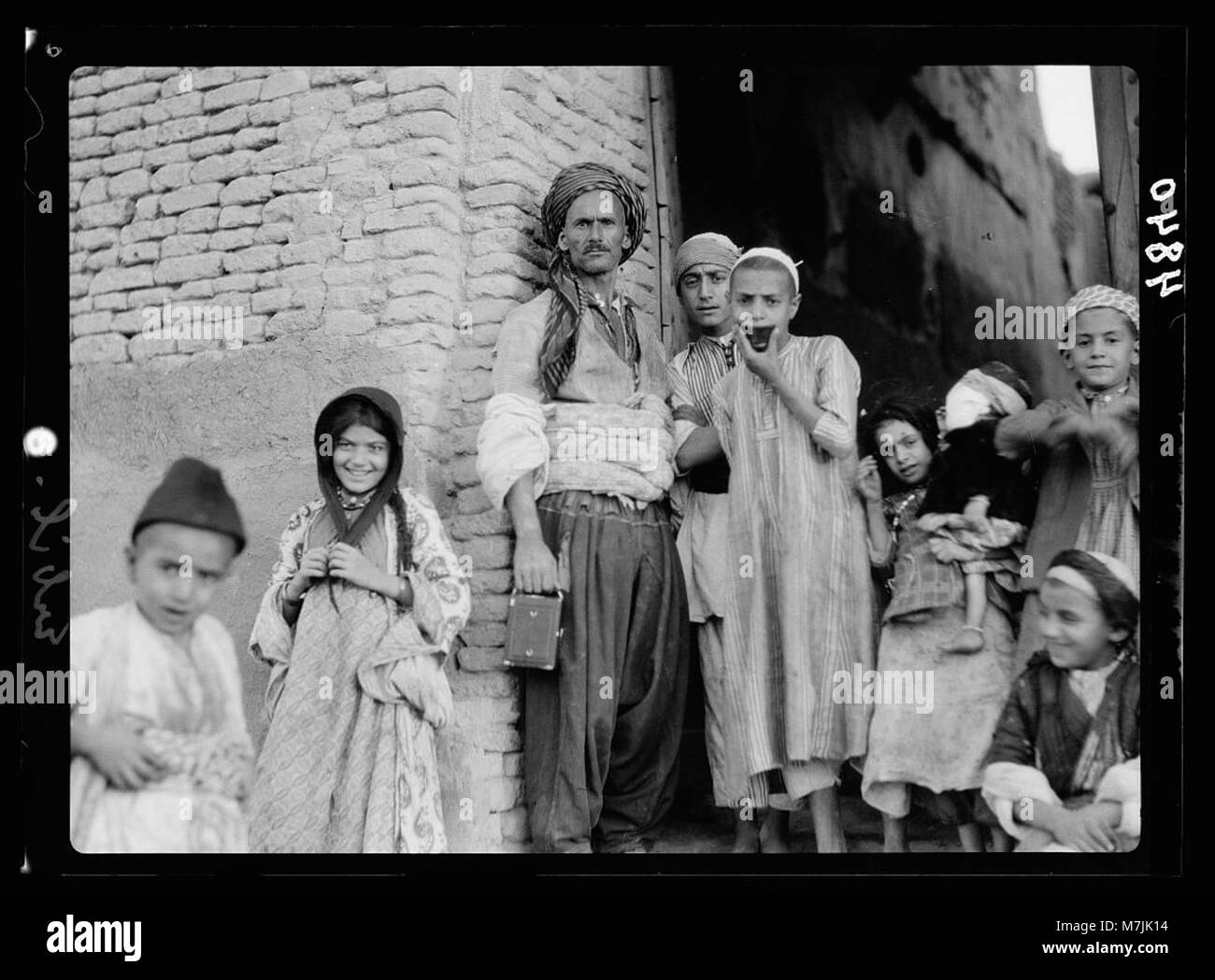 A historical photograph of Arbela (Erbil), Iraq, showcasing a typical ...