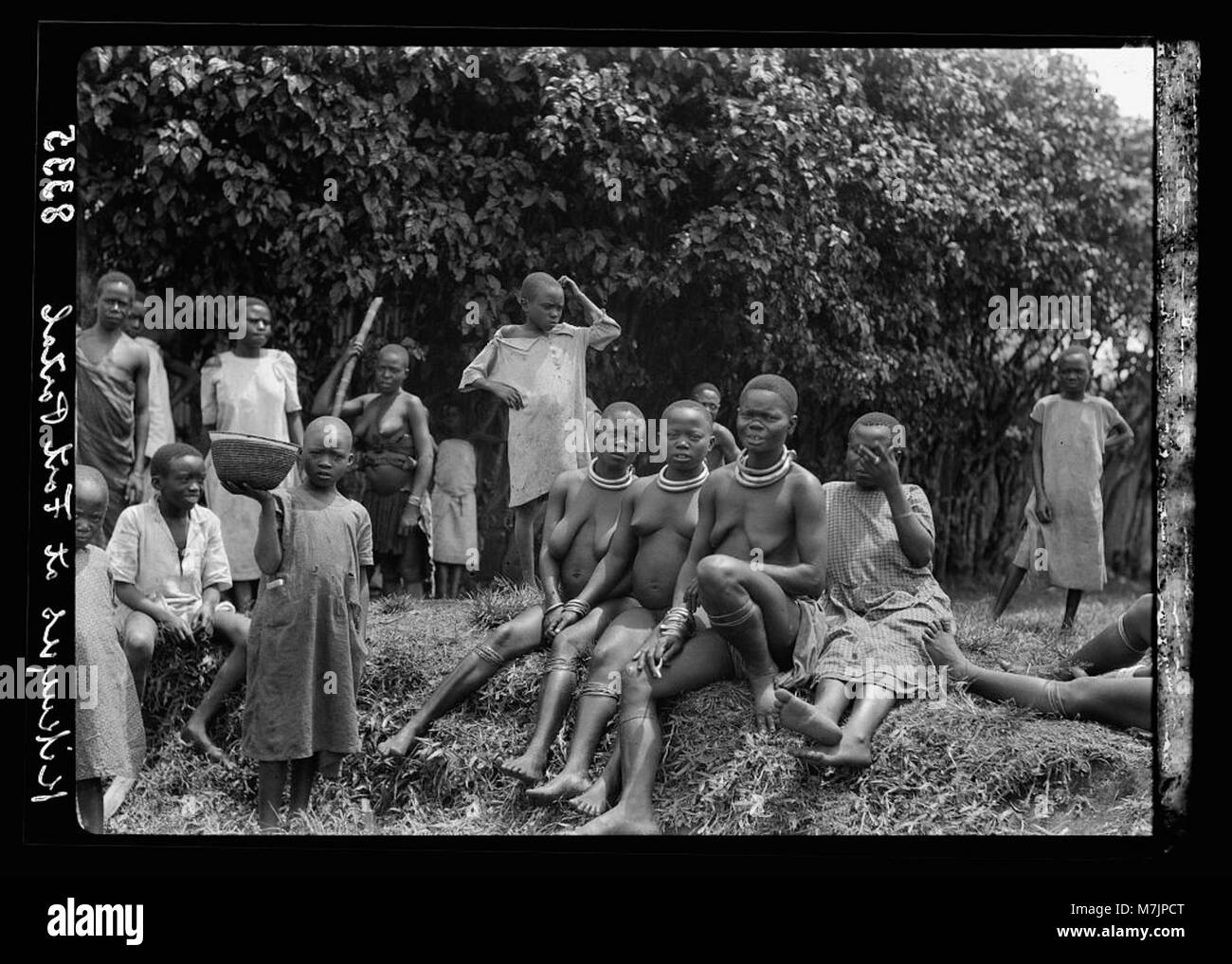 Uganda. From Hoima to Fort Portal. Group of native women and children ...