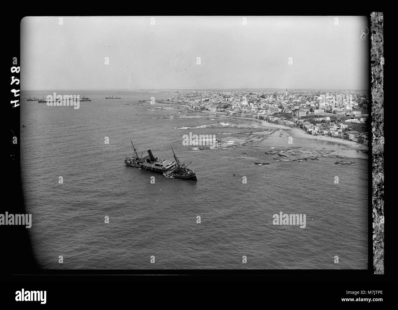 Air views of Palestine. Jaffa, Auji River and Levant Fair. Orange steamer grounded off Jaffa showing rocky coast LOC matpc.15883 Stock Photo