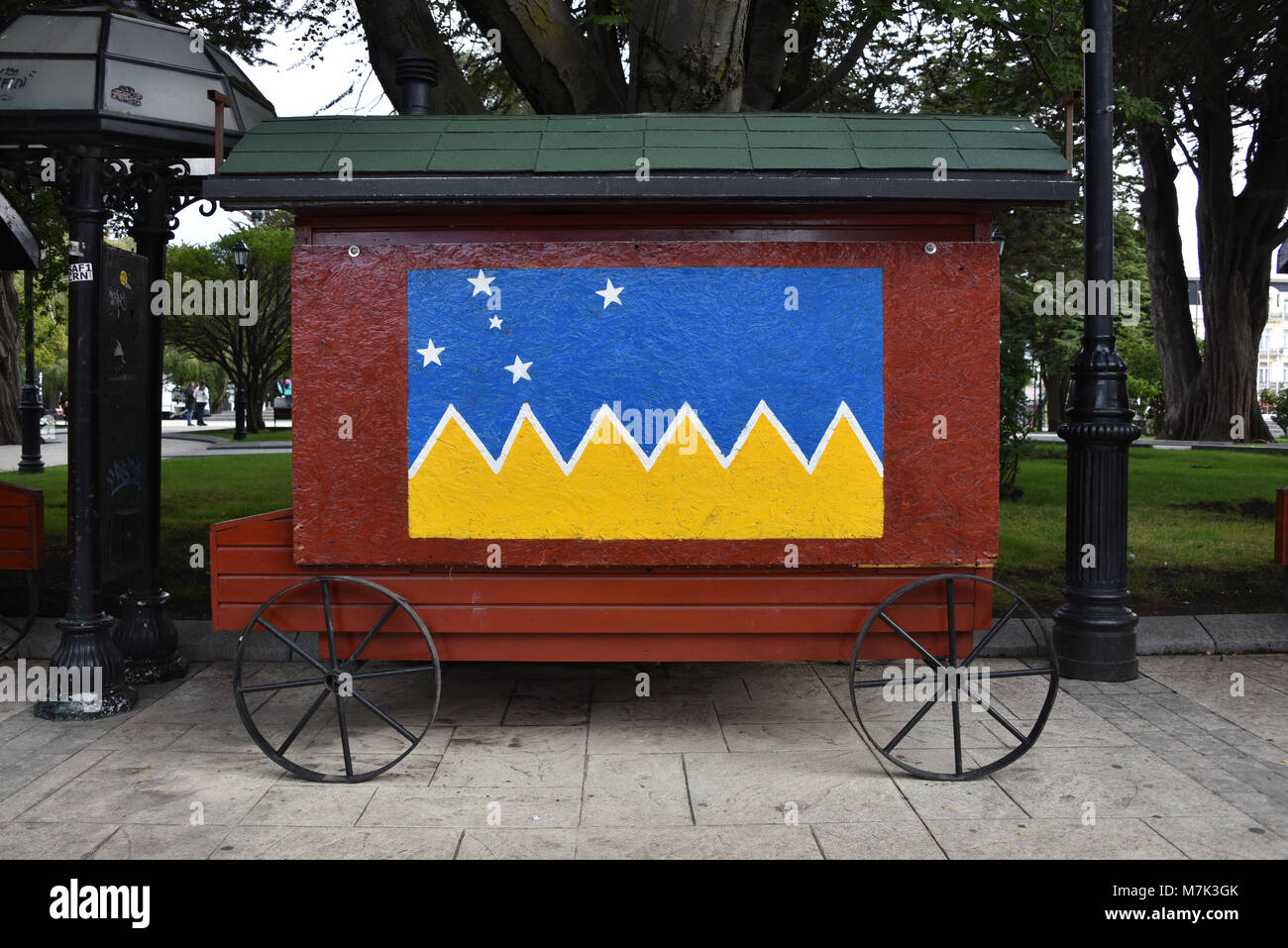 Magellanic Flag painted on the side of a tourist stall carriage in the main square of Punta Arenas, Chile Stock Photo