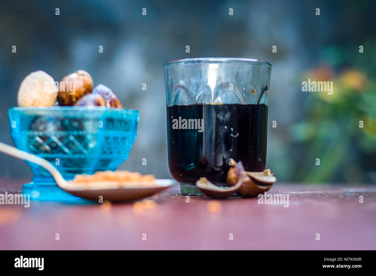 Close up of Nutmeg tea,Jaiphal,Myristica fragrans in a glass container
