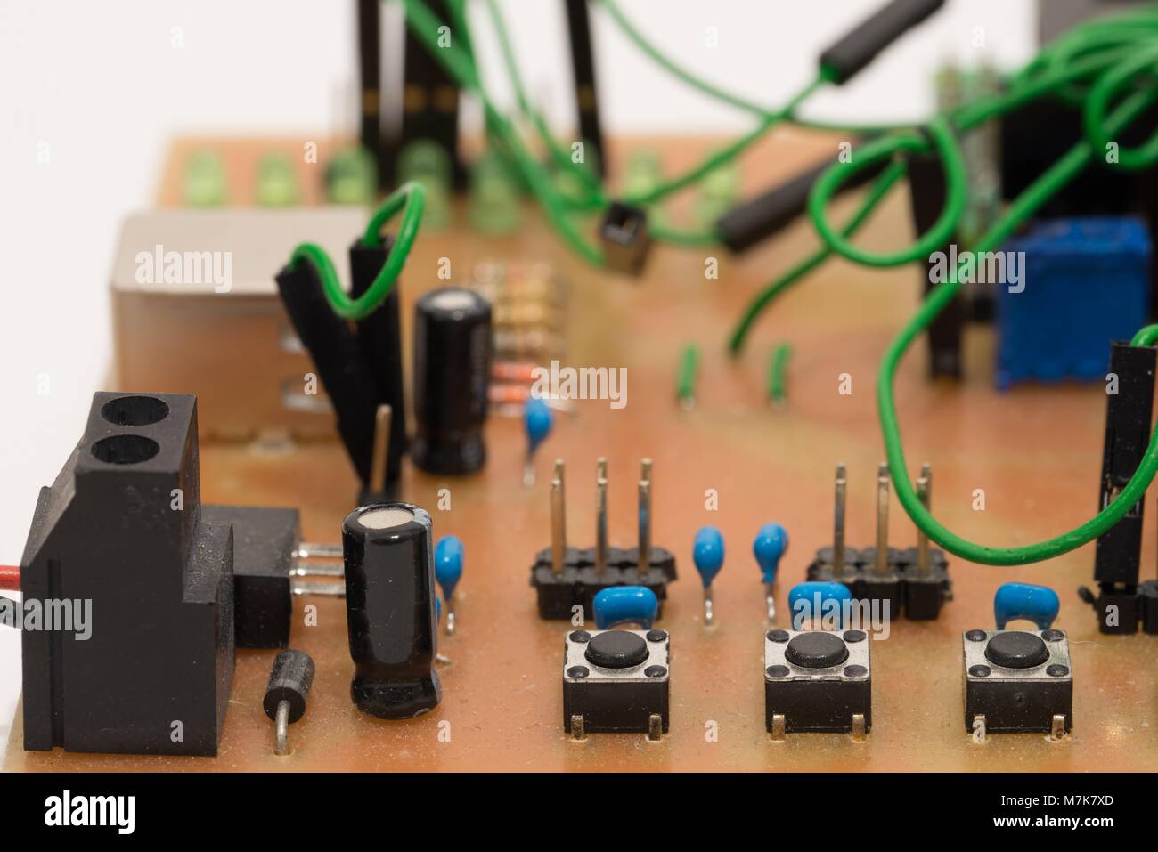 Closeup of a self-made printed circuit board with microcontroller Stock Photo