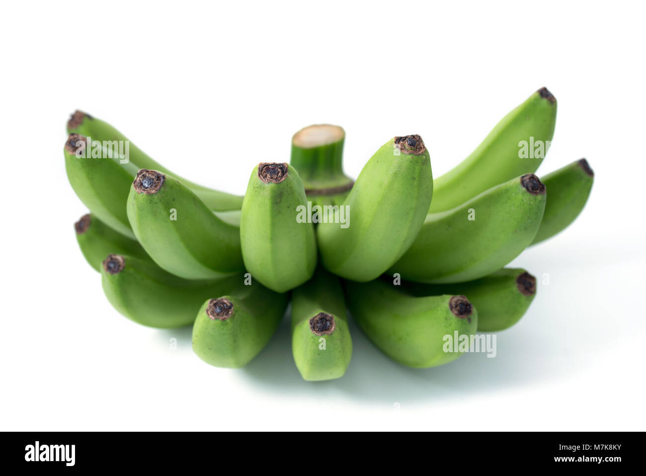 bunch of green bananas isolated on white background Stock Photo