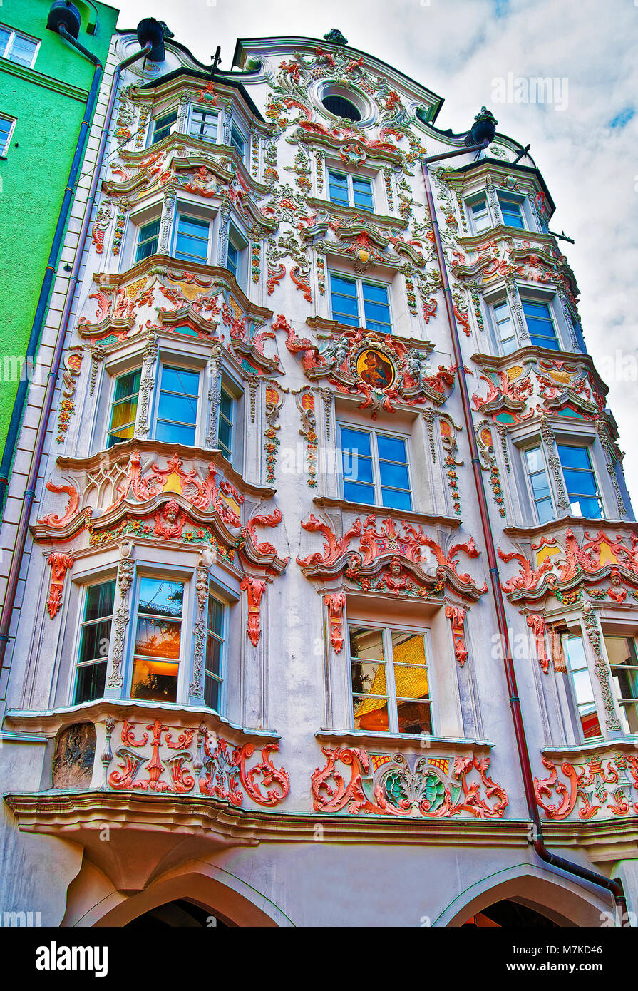 Innsbruck, Austria - January 4, 2010: House of Helbling with Baroque style facade in Innsbruck of Austria. Ornamental facade is decorated with sculptu Stock Photo