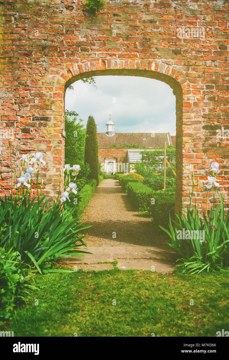 York, England - May 12, 2011: Old manor and its garden in York in England. York City is situated in North Yorkshire of UK. Stock Photo