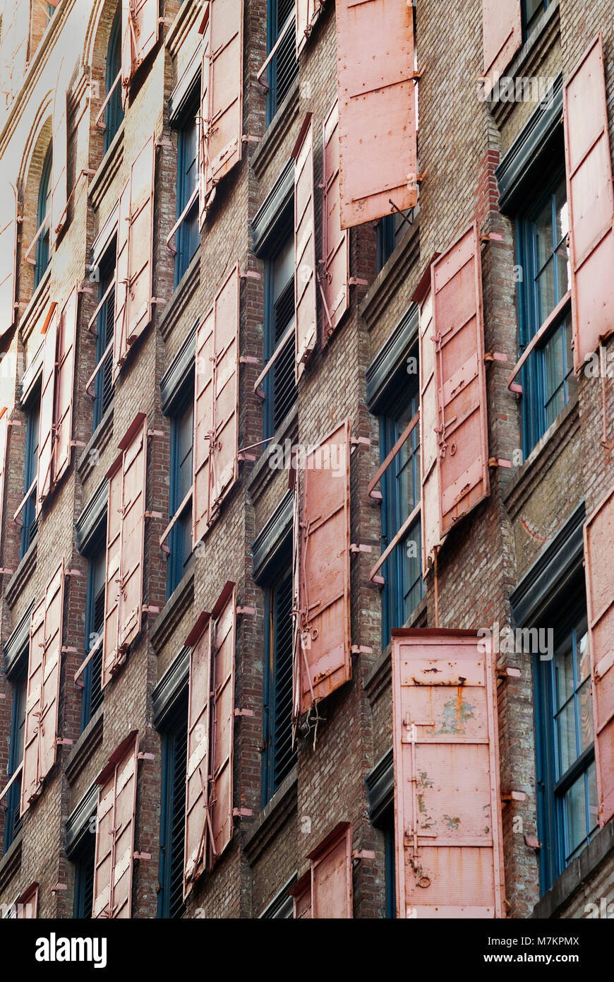 Storm shutters on a building in SoHo, New York Stock Photo