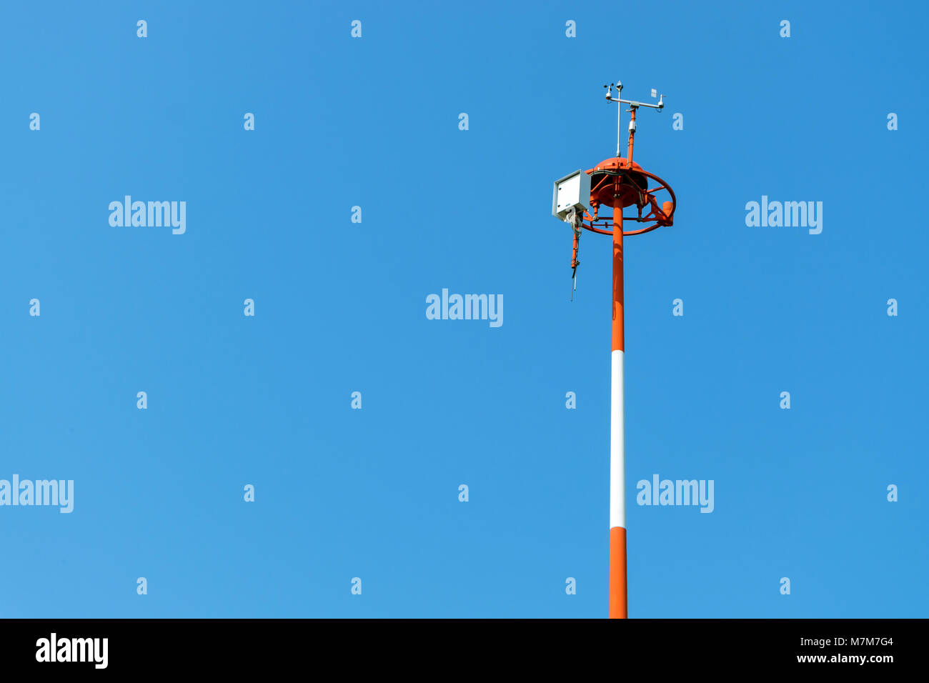 Smart agriculture and smart farm technology concept. Revolving vane anemometer, a meteorological instrument used to measure the wind speed and solar c Stock Photo