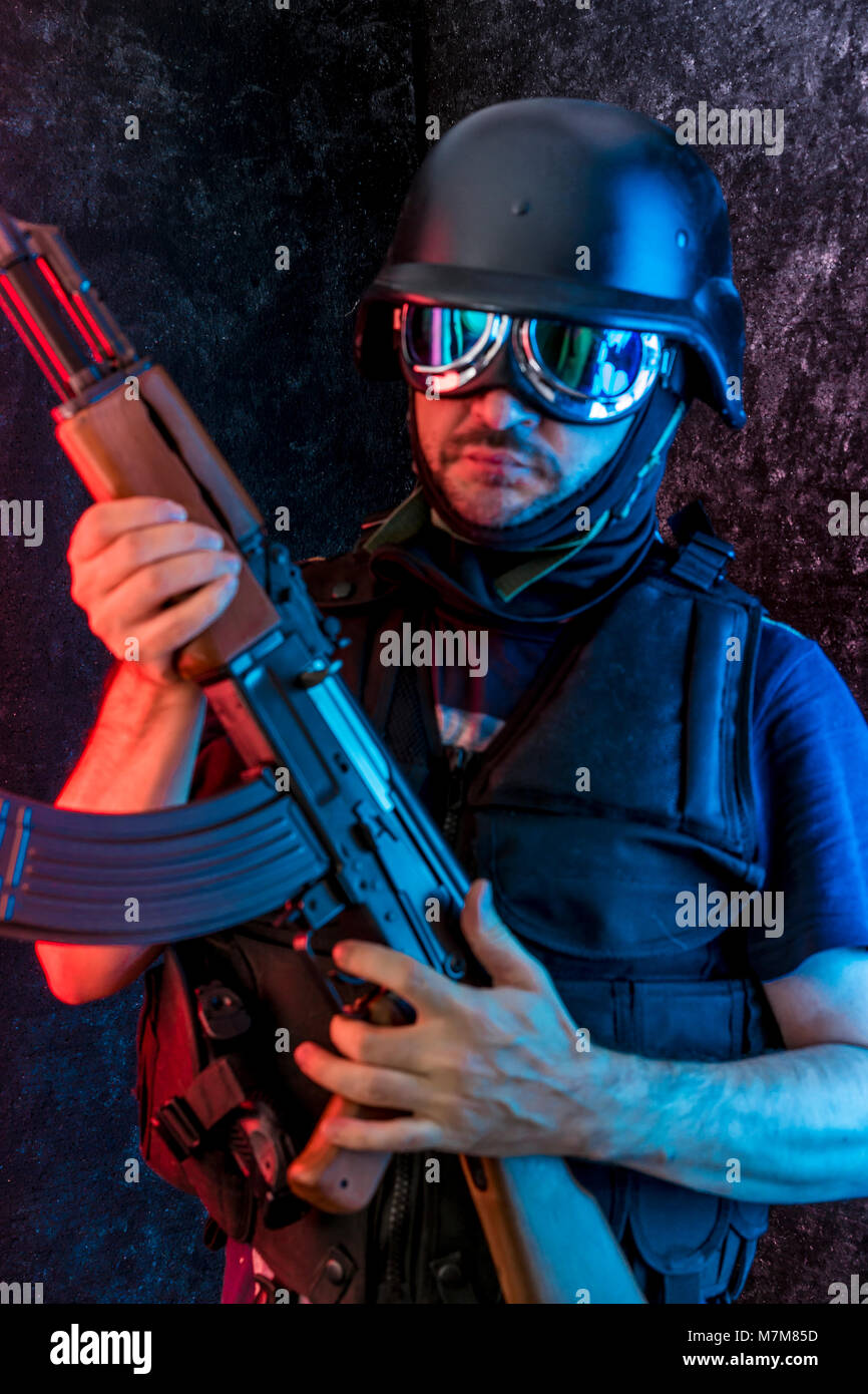 Thief, Man Armed With Shotgun And Bulletproof Vest Stock Photo - Alamy