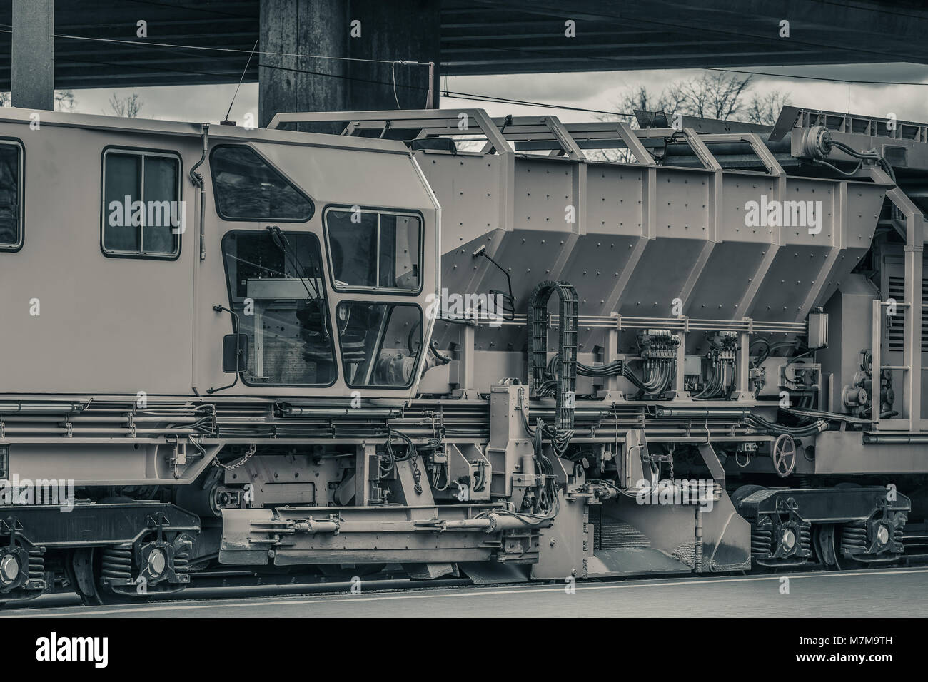 Ballast distributing and profiling track machine. Repair train Stock