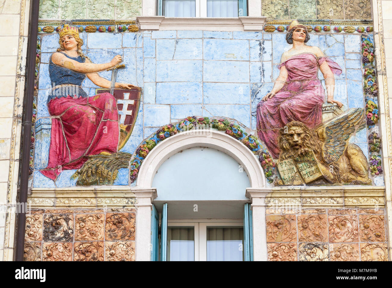 Art Nouveau bas-relief female figures and majolica polychrome tiles on the Ausonia Palace Hotel,  or Grande Albergo Ausonia and Hungaria, Lido, Venice Stock Photo