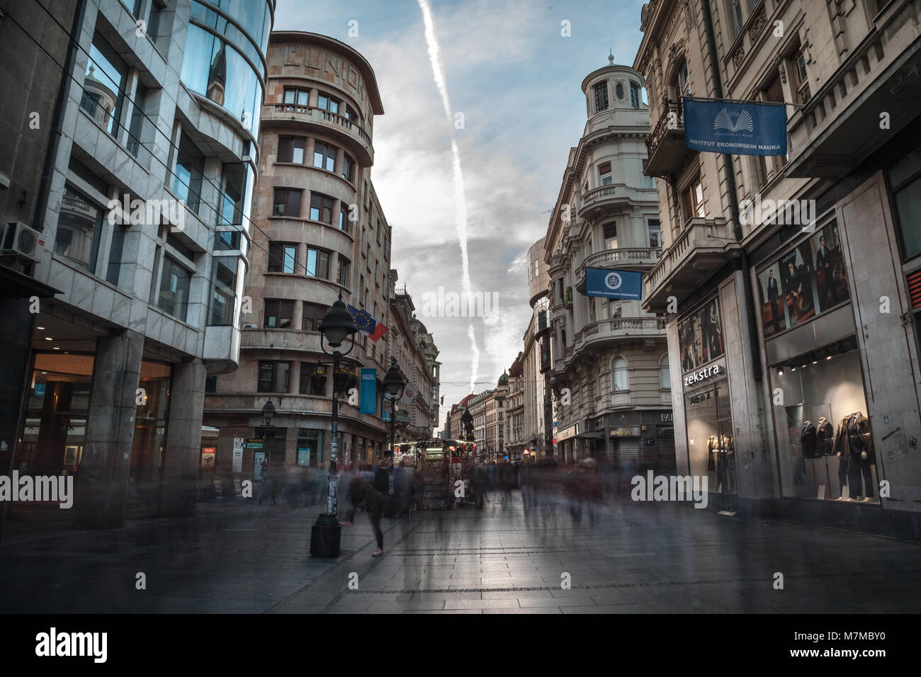 BELGRADE, SERBIA - MARCH 11, 2018: Kneza Mihailova street at dawn, crowded. Also known as Knez Mihaila, this is the main pedestrian street of the city Stock Photo