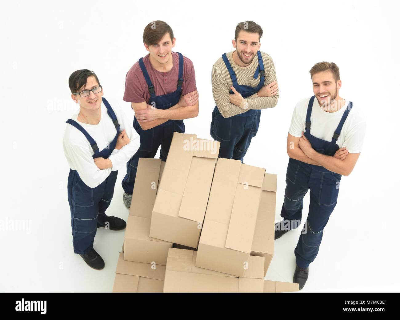 Woman holding a box royalty free stock photo. Человек рядом с большим ящиком. She at the parcel long enough, before she. Woman holding box. Мужчина с пакетами на плече.