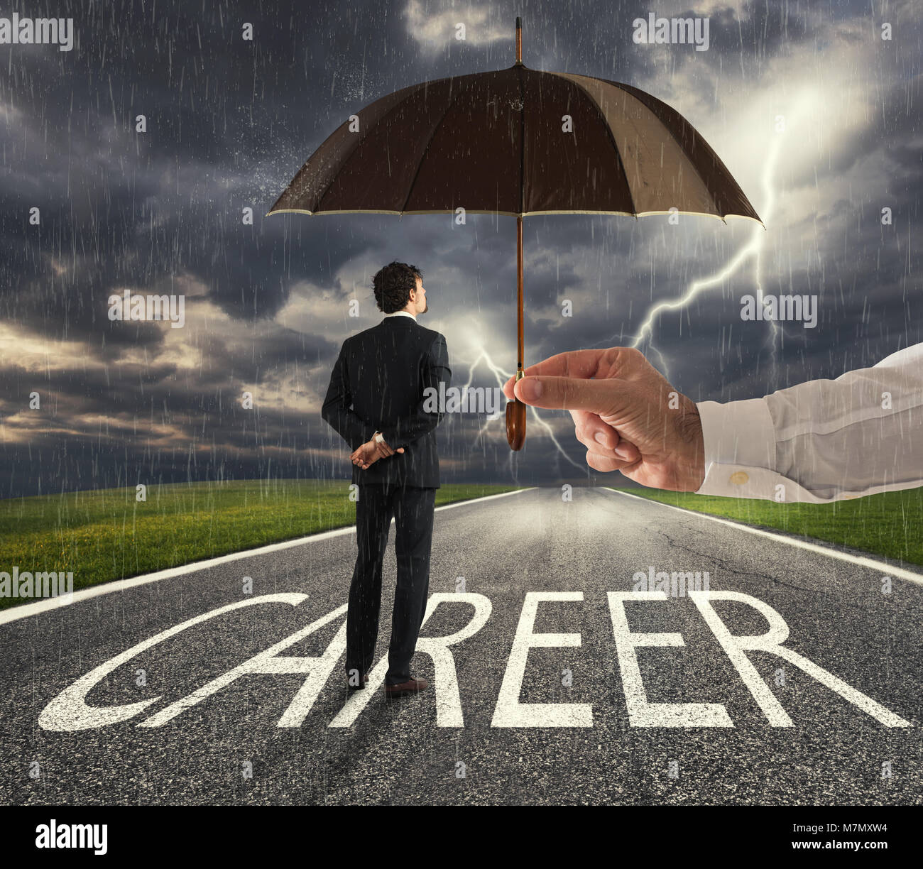 Businessman ready to start a difficult career way with a big help of an umbrella. concept of support and assistance Stock Photo