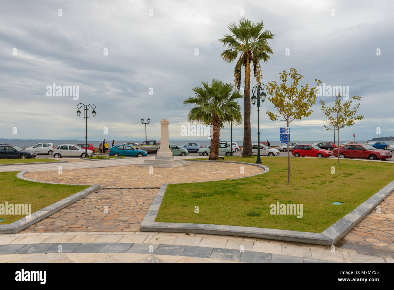ZAKYNTHOS, GREECE - September 29, 2017: View of palm trees and sea from main square in Zakynthos town, Greece. Stock Photo