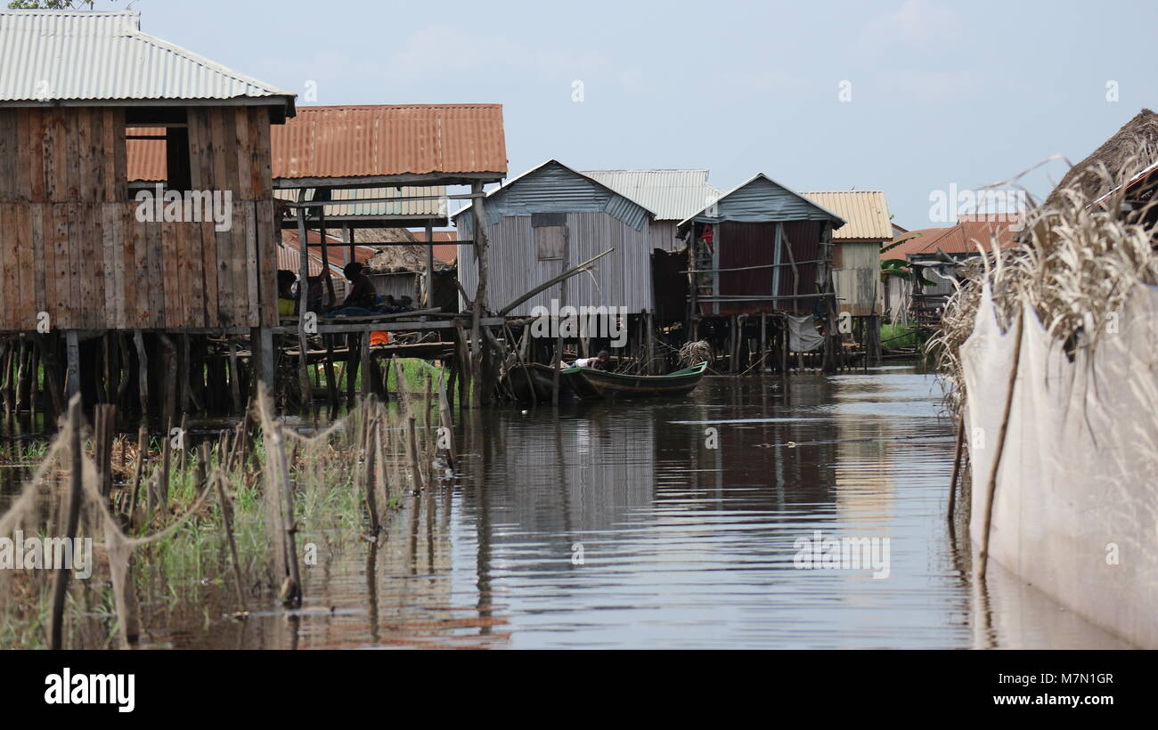 Stilt houses and traditional fish farming enclosures in Ganvie village on lake Nokoue in Benin, West Africa Stock Photo