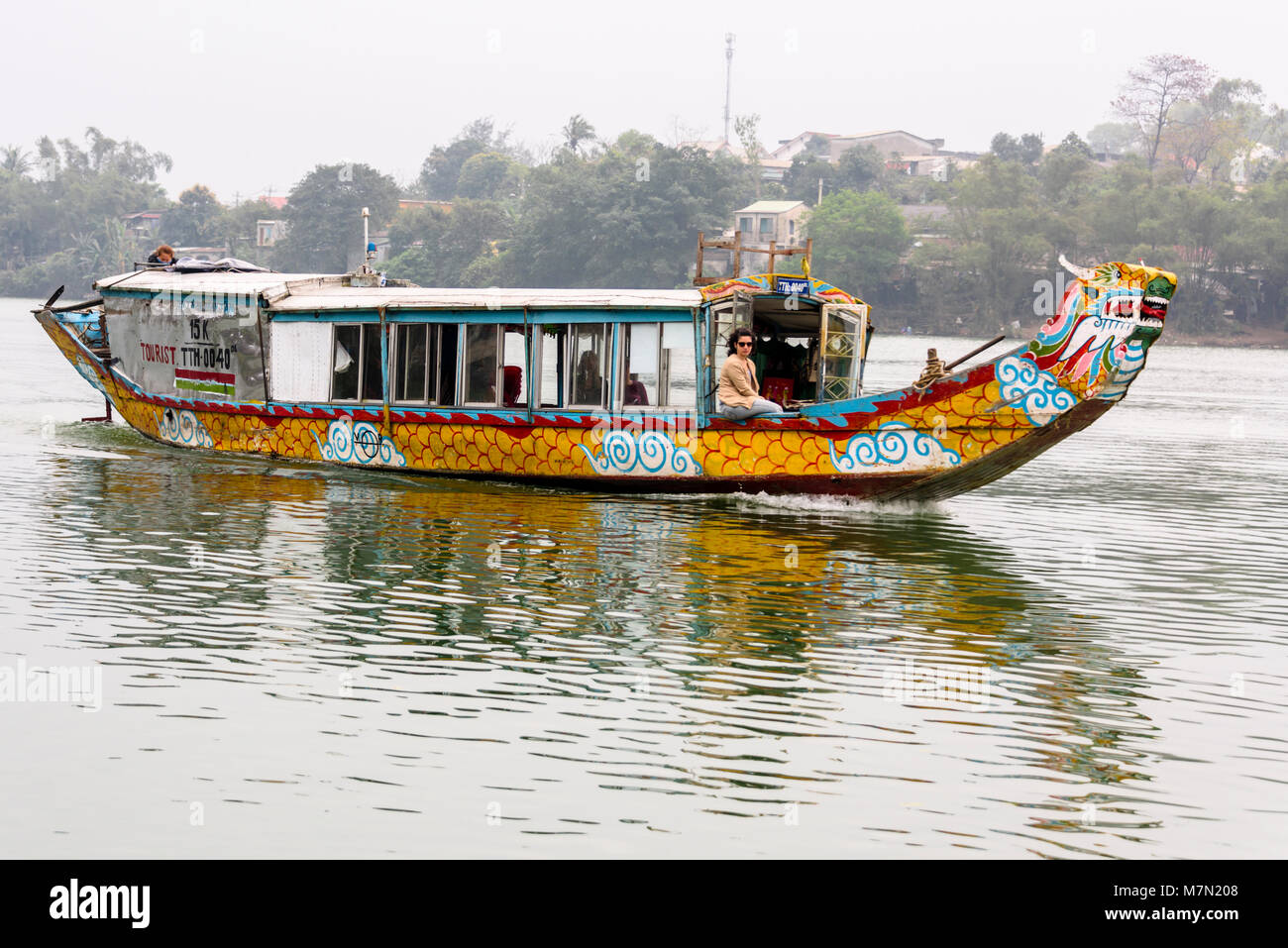 Dragon boat which can be hired by tourists sailing on the Perfume River, Hue, Vietnam Stock Photo