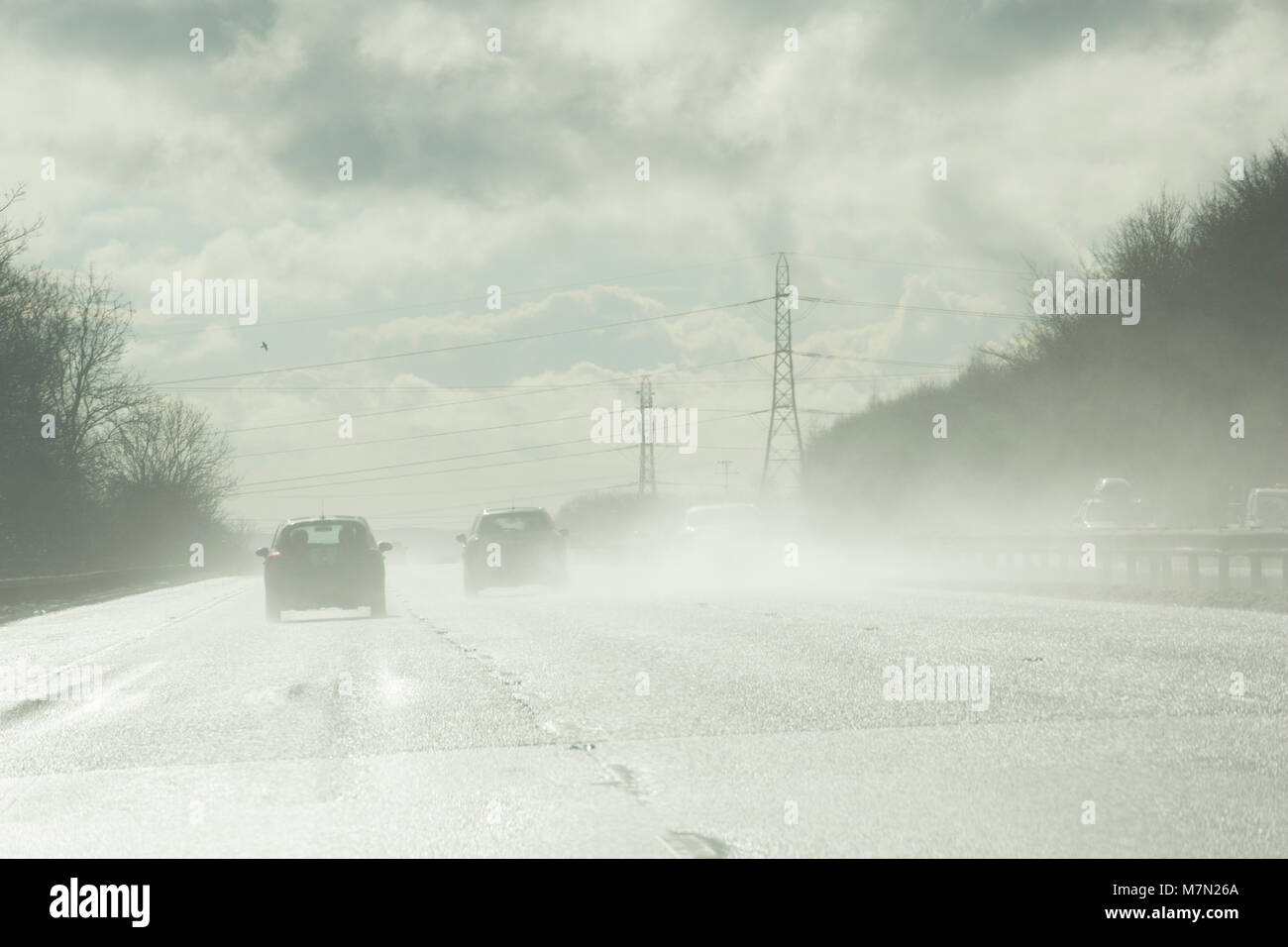 Spray and glare after rain on the M5 motorway southbound in England UK GB March 4 2018 after Storm Emma. Stock Photo