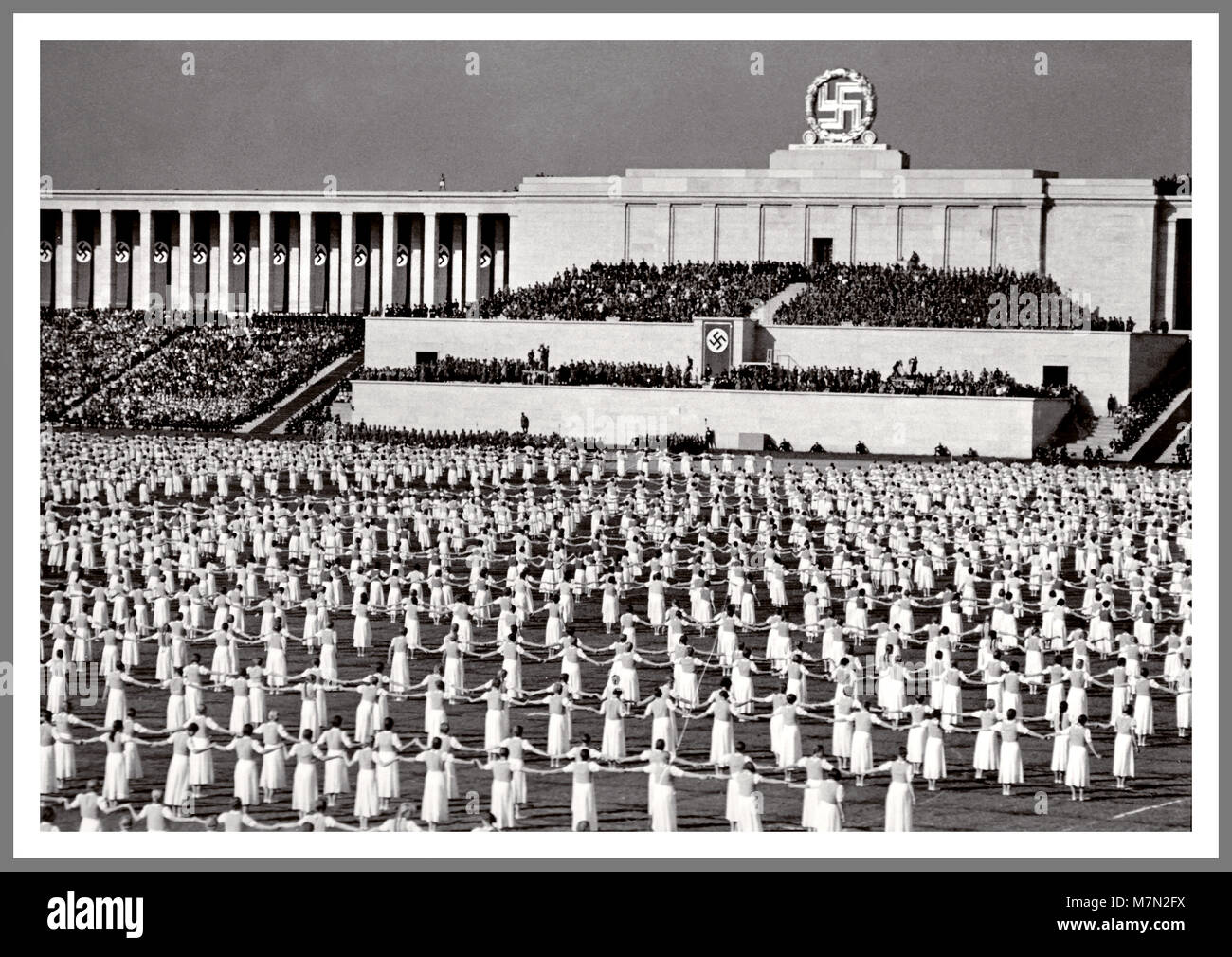 1930's Nazi propaganda image of Nuremberg Rally Reichsparteitag  Realm Party Convention. It was the annual rally of the Nazi Party in Germany, held from 1923 to 1938. They were large Nazi propaganda events, especially after Adolf Hitler's rise to power in 1933. These events were held at the Nazi party rally grounds in Nuremberg from 1933 to 1938 and are usually referred to as the 'Nuremberg Rallies'. Stock Photo