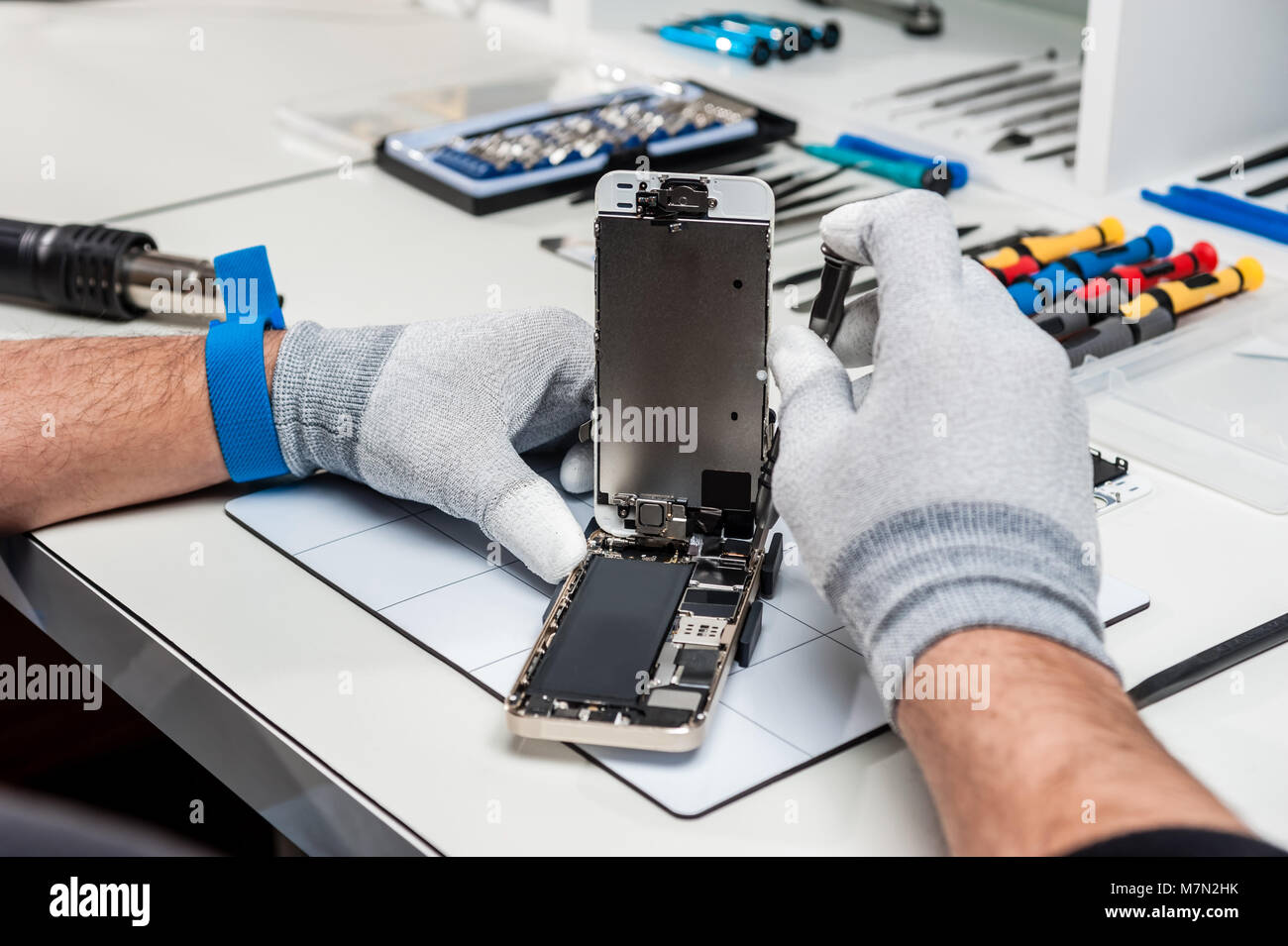 Closeup photos showing process of mobile phone repair Stock Photo Alamy