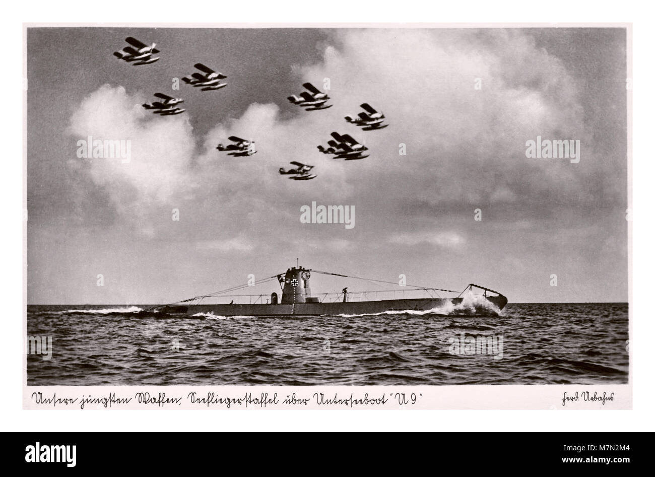 1914 WW1 GERMAN U-BOAT SUBMARINE Vintage WW1 propaganda postcard of German U Boat U9 of Imperial German Navy with squadron of German Seaplanes flying over in formation Stock Photo