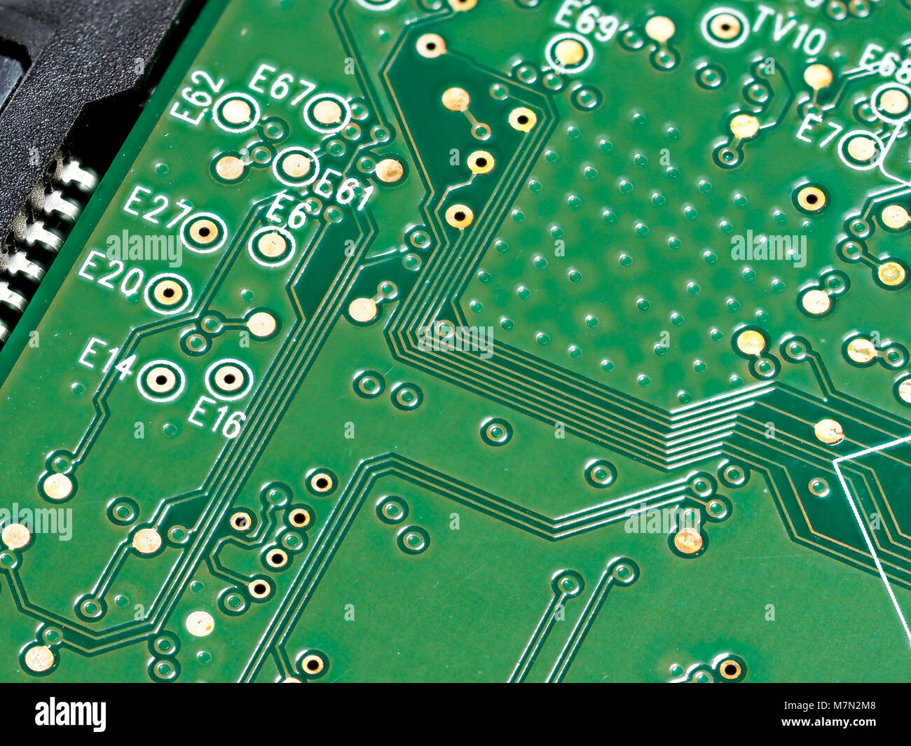 Closeup of green computer mother board, electronic elements and circuit Stock Photo