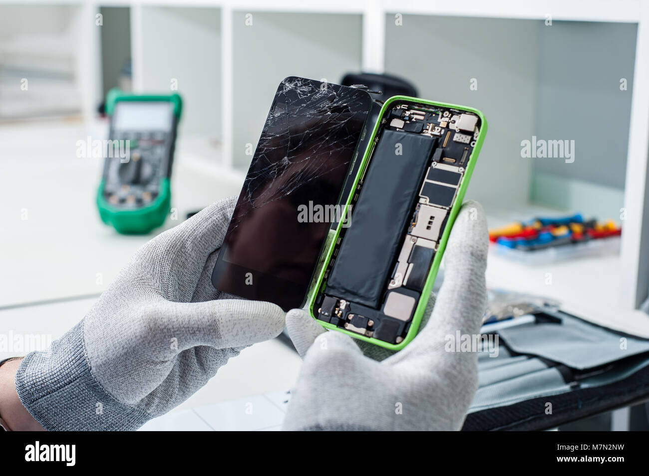 Phone Getting Repaired Close-up photos showing process of mobile phone repair Stock Photo - Alamy