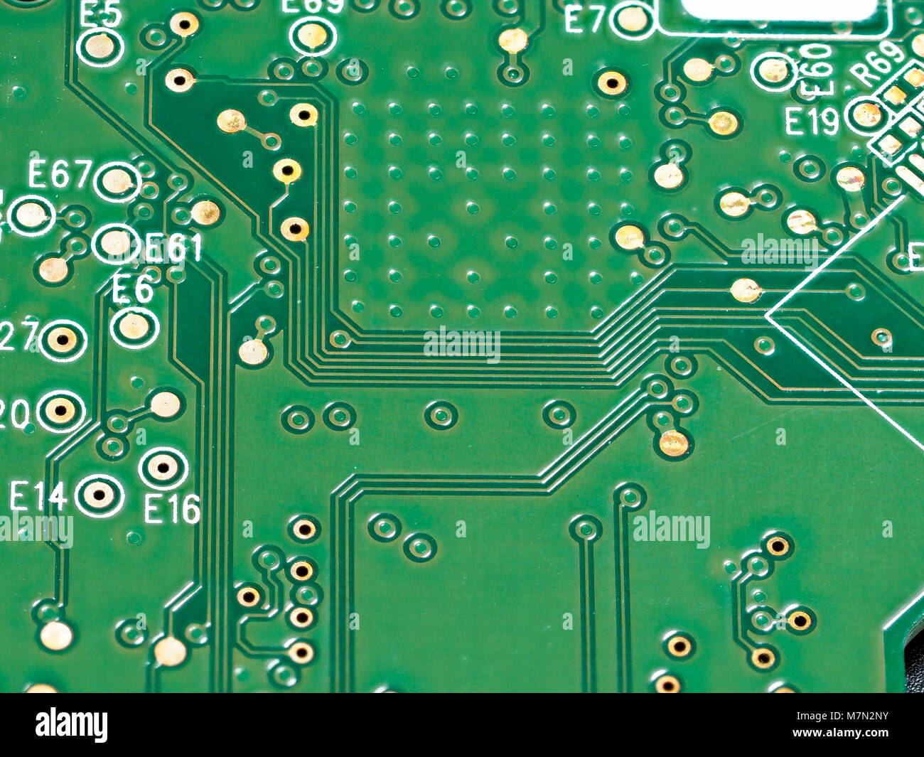 Closeup of green computer mother board, electronic elements and circuit Stock Photo