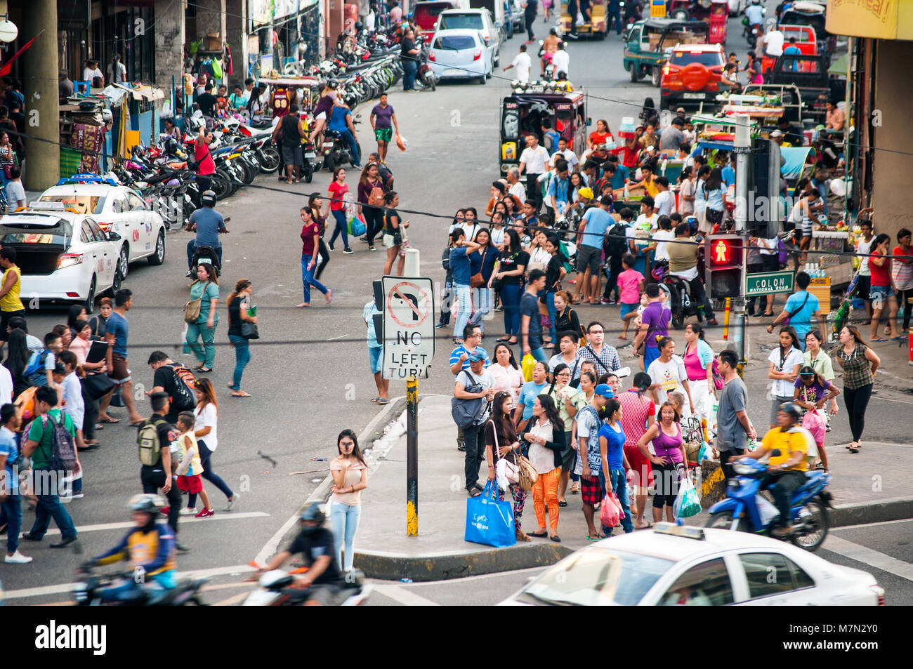 Aerial view of pederstrians crossing Colon Street, Cebu City, Philippines Stock Photo
