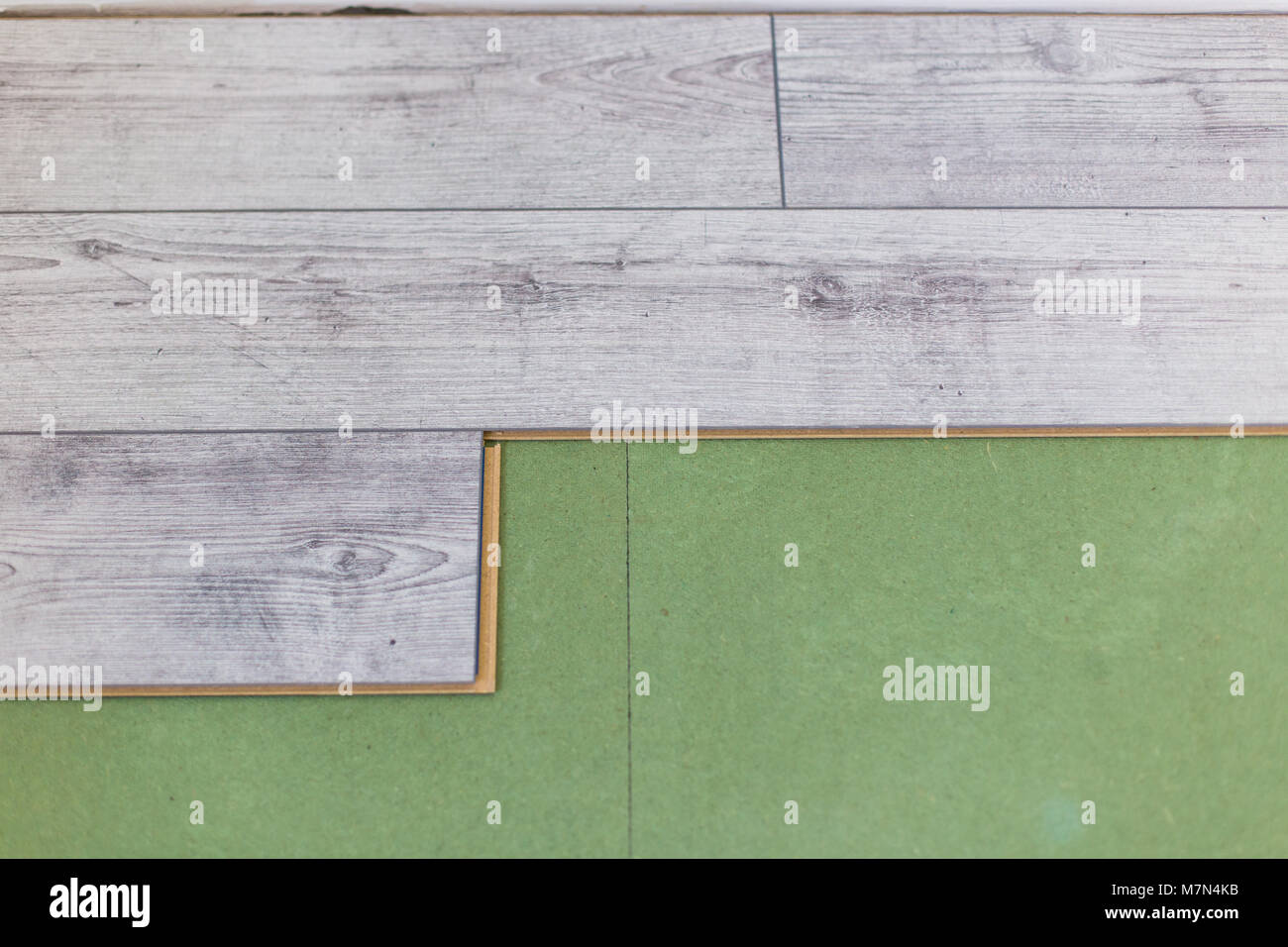 Installing laminate flooring. Install of laminate floor Stock Photo Alamy