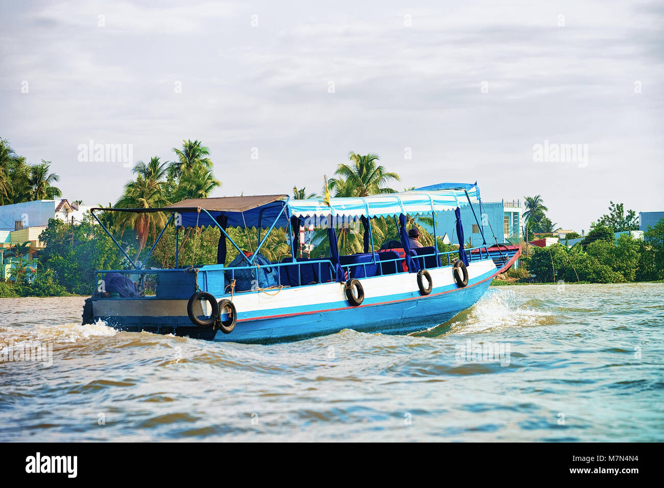 Ferry boat at the Floating market at the delta Mekong in Can Tho ...