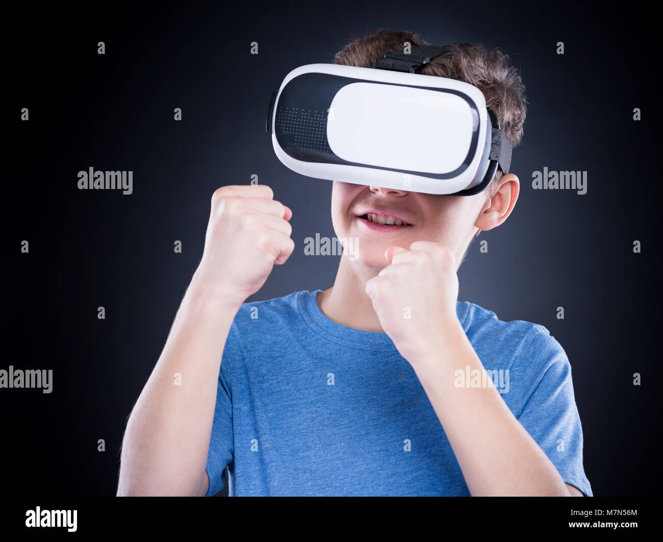 Teen boy in VR glasses Stock Photo Alamy
