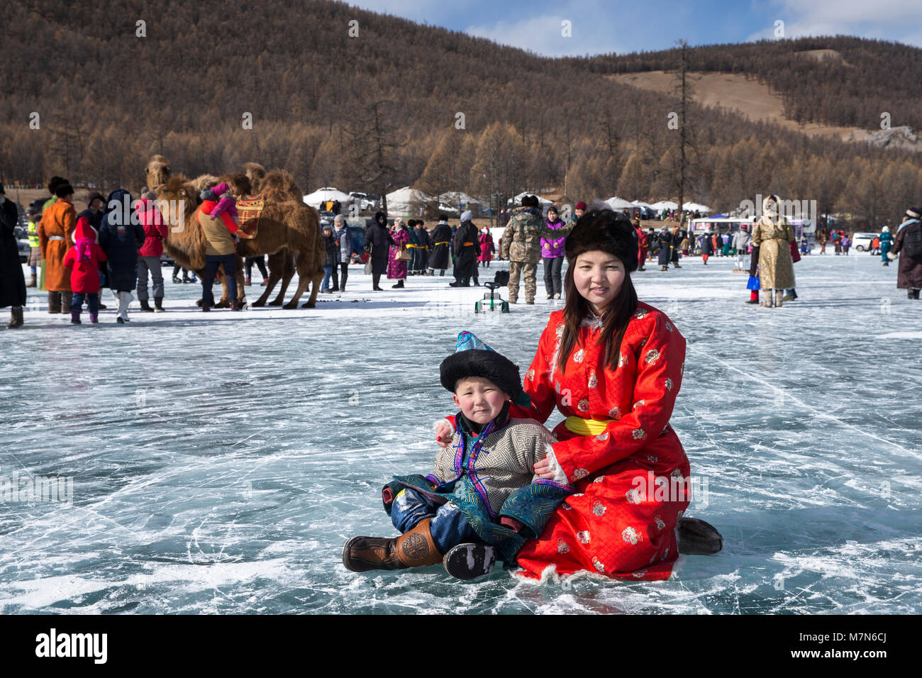 Hatgal, Mongolia, 3rd March 2018: mongolian people on a frozen lake Khuvsgul during a ice festival in winter Stock Photo