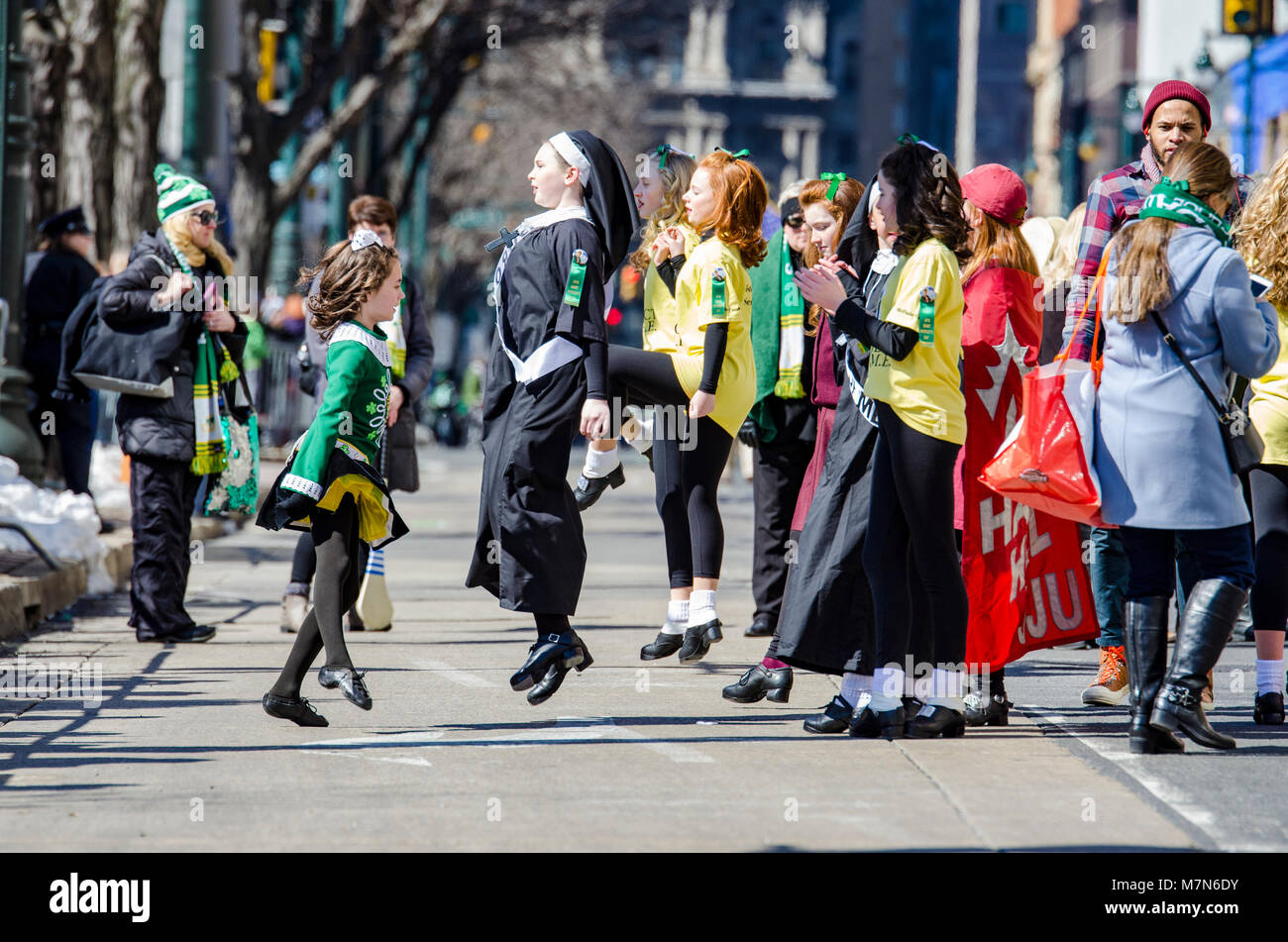 Hundreds lined Philadelphia's streets to celebrate the annual St Patrick's Day parade Stock