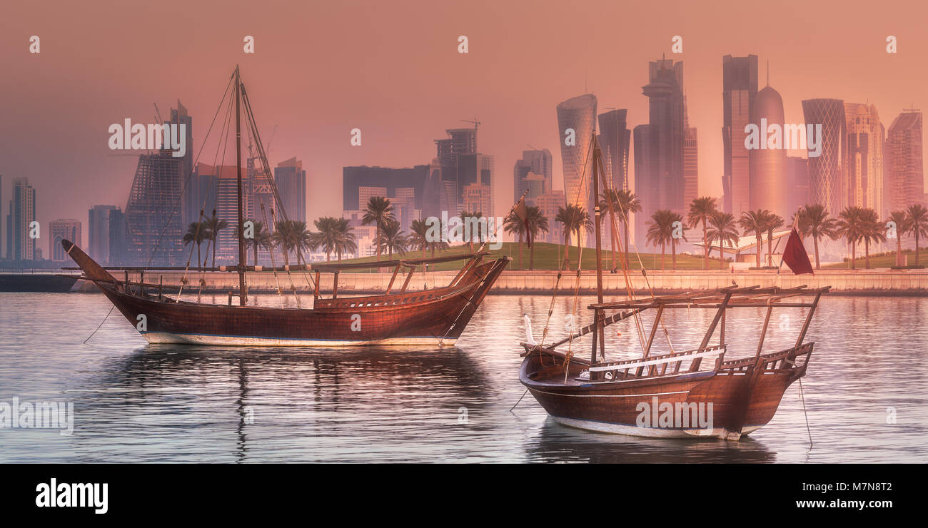 Traditional Arabic Dhow boats in Doha harbour Stock Photo - Alamy