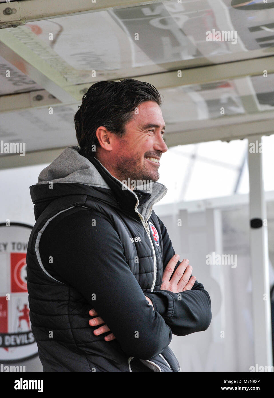 Crawley head coach Harry Kewell looks relaxed before the Sky Bet League 2 match between Crawley Town and Morecambe at the Checkatrade Stadium in Crawley. 10 Mar 2018 - Editorial use only. No merchandising. For Football images FA and Premier League restrictions apply inc. no internet/mobile usage without FAPL license - for details contact Football Dataco Stock Photo