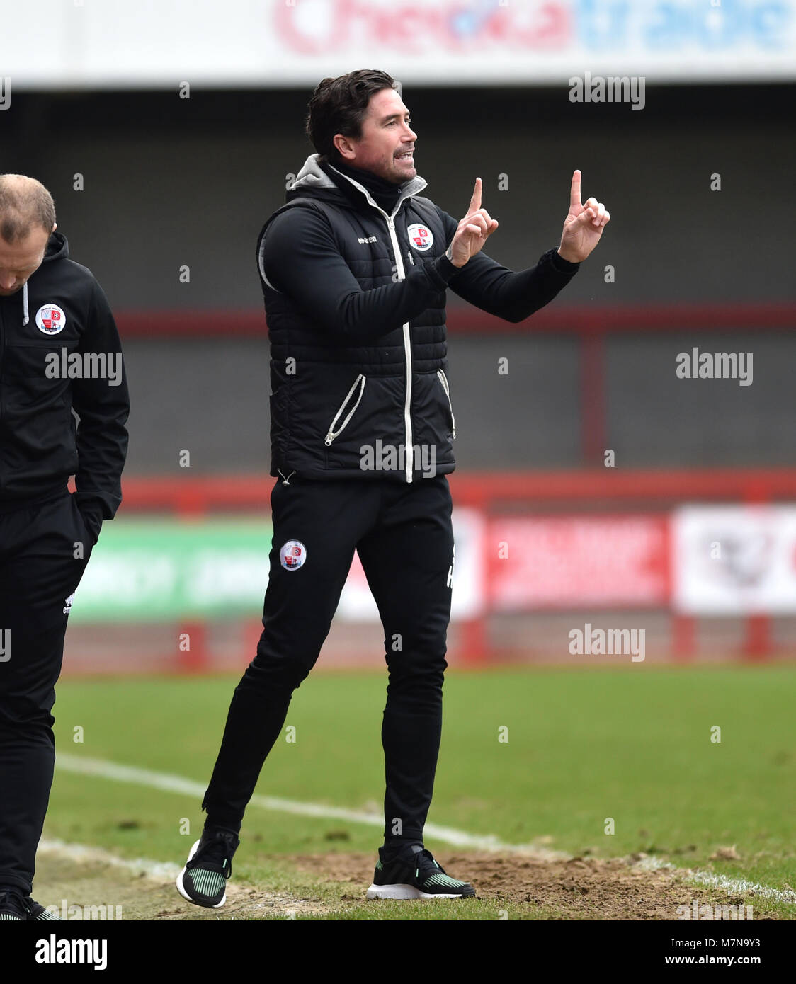 Crawley head coach Harry Kewell during the Sky Bet League 2 match between Crawley Town and Morecambe at the Checkatrade Stadium in Crawley. 10 Mar 2018 - Editorial use only. No merchandising. For Football images FA and Premier League restrictions apply inc. no internet/mobile usage without FAPL license - for details contact Football Dataco Stock Photo