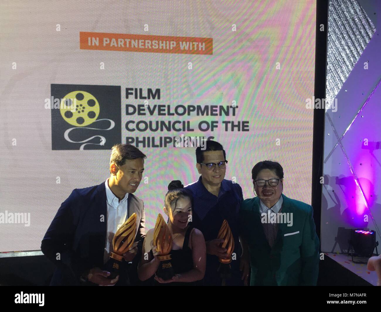 The 4th Sinag Maynila Independent Film Festival concluded at Conrad Hotel in Pasay City with the awarding of the winners in different categories: BEST SHORT FILM: The Duwende by Odin Fernandez BEST DOCUMENTARY: (Mahal, 2017) by Janine Patricia Santos JURY AWARD (DOCUMENTARY): Journeyman Finds Home: The Simone Rota Story by Albert Almendralejo, Maricel Cariaga BEST SOUND: Mikko Quizon for Abomination BEST MUSIC: Fergus Cronkite for Melody/Random/Melbourne! BEST PRODUCTION DESIGN: El Peste BEST EDITING: Diego Marx Robles for Tale of the Lost Boys BEST CINEMATOGRAPHY: Pipo Domagas for Bomba (The Stock Photo