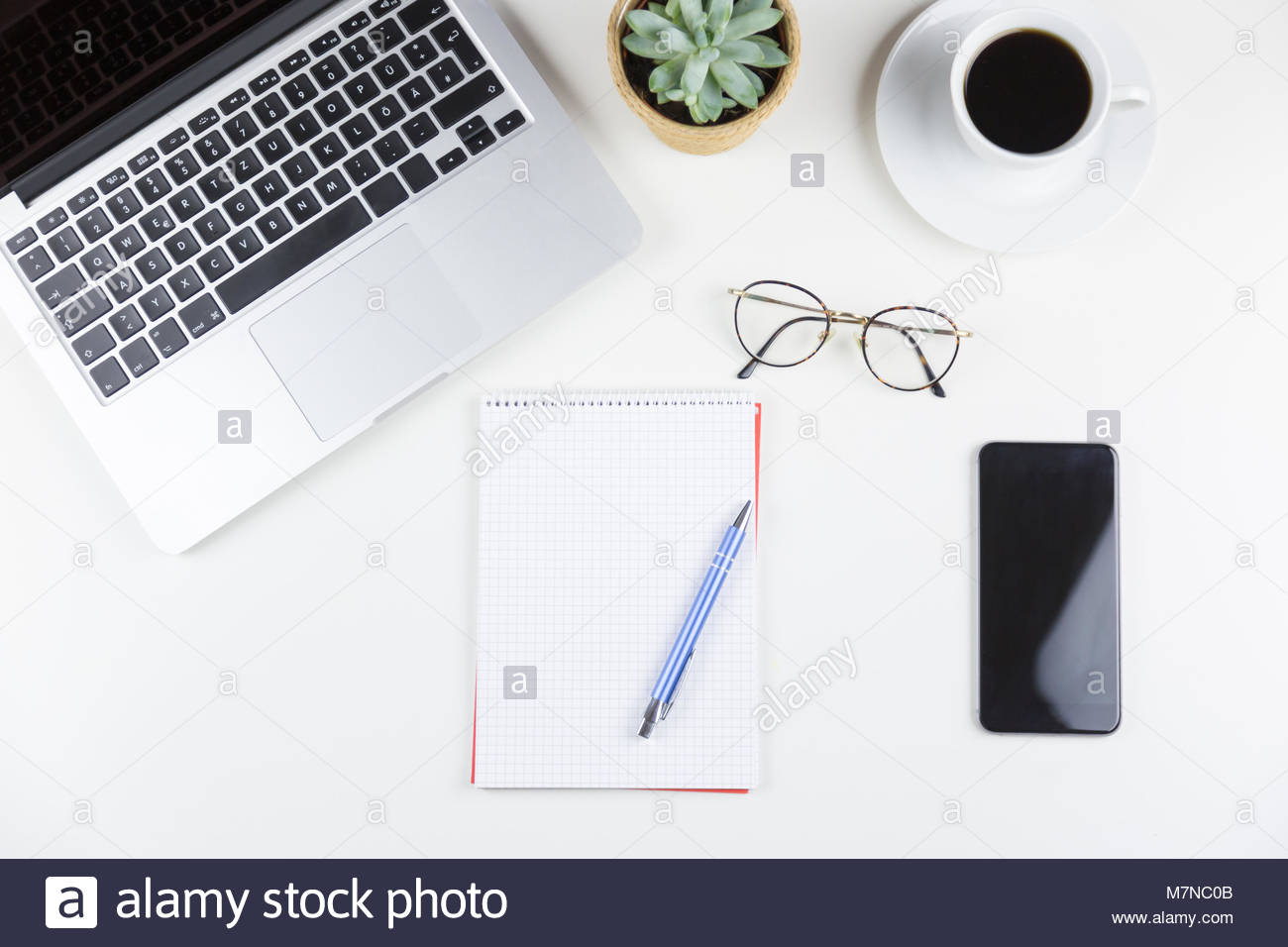 Neat Workstation Or Desk Viewed From Overhead Stock Photo