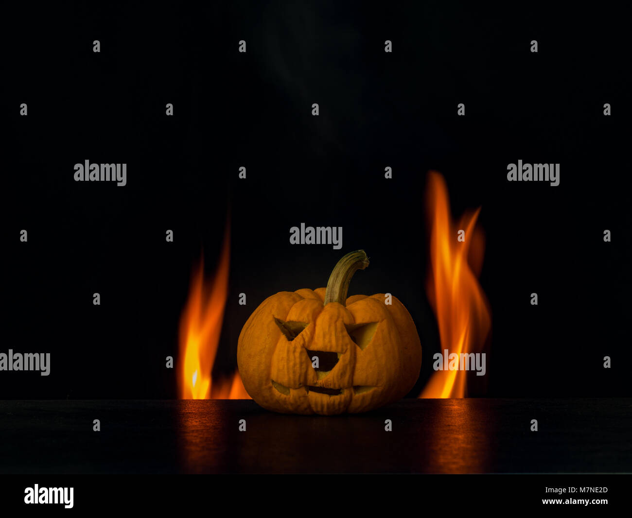pumpkin on fire background, isolate black background Stock Photo - Alamy