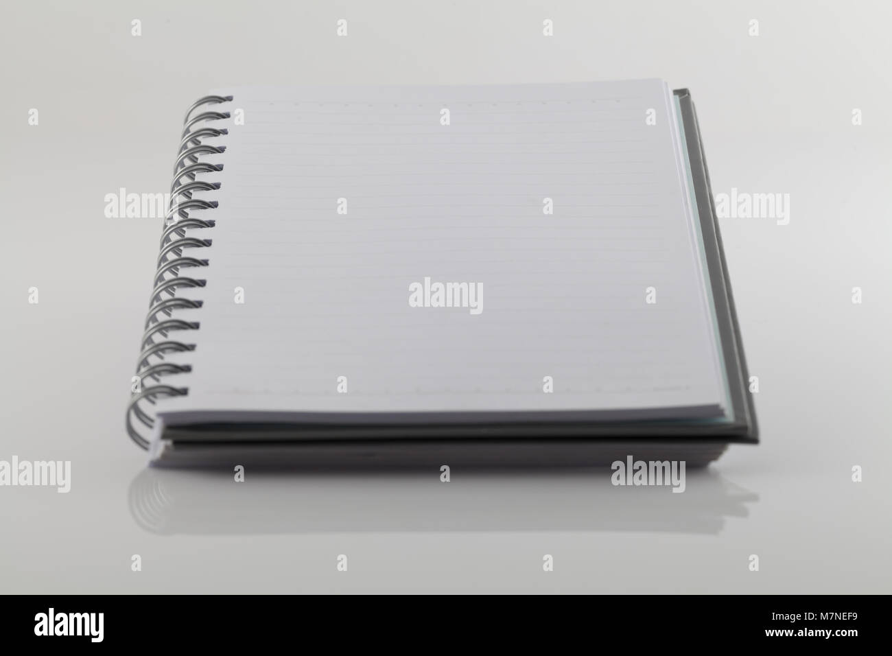 white note book isolate on white background Stock Photo - Alamy