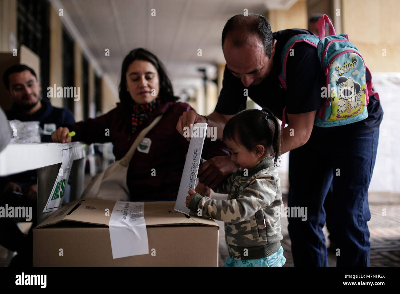 Bogota. 11th Mar, 2018. A man casts ballot during the congressional elections at a polling station in Bogota March 11, 2018. Colombia on Sunday held elections for members of Congress. Credit: Jhon Paz/Xinhua/Alamy Live News Stock Photo