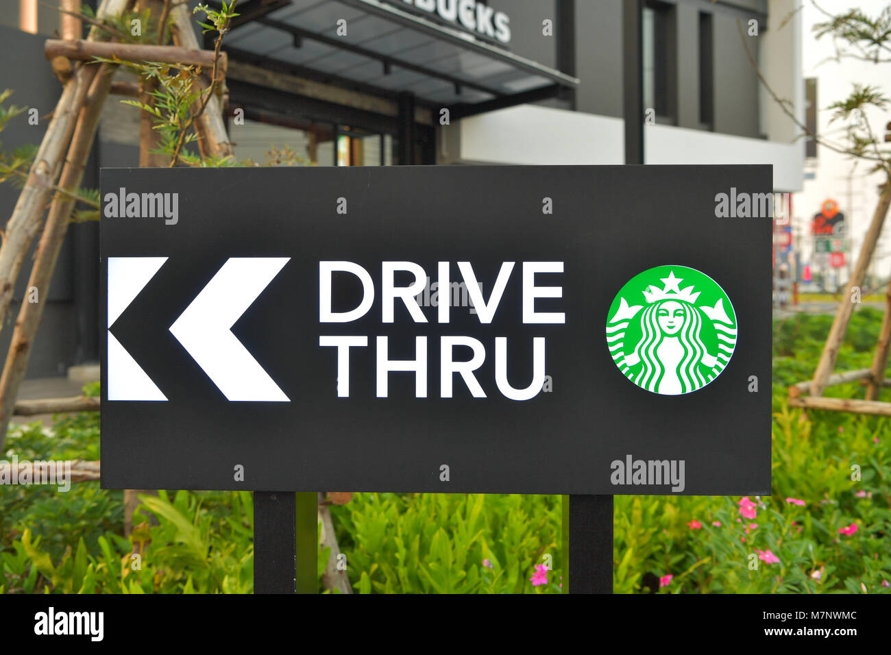 AYUTTHAYA - MARCH 11 : Starbucks Coffee in Thailand, Corporation is An American global coffee company and coffeehouse, during the day hours on March 11, 2018, Ayutthaya Thailand. Stock Photo