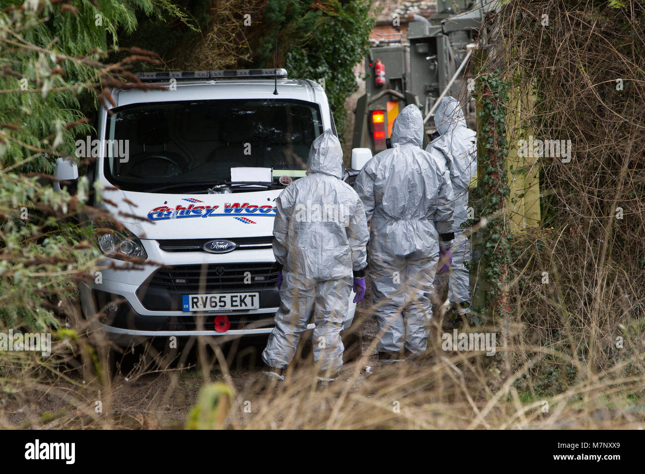 The Army are brought in to collect an Ashley Wood recovery van from West Winterslow that was thought to have been used to tow Sergei Skripal's BMW away. Army personal, dressed in hazzard suits can be seen attaching the van to a cable ready to be pulled onto a recovery trailer Stock Photo