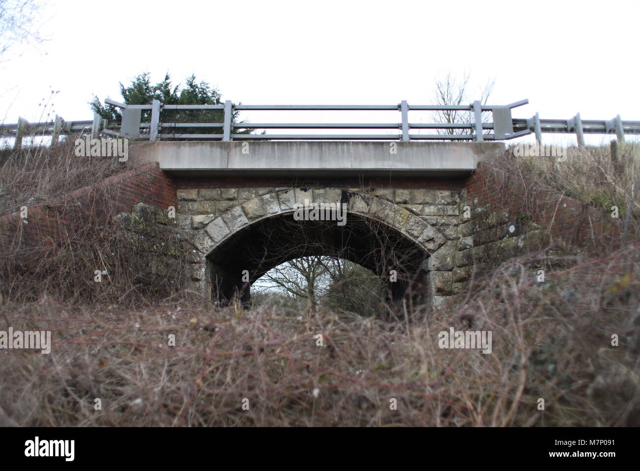 Old Henstridge railway bridge, trains on the Somerset and Dorset line would have travelled under to get to Henstridge station (where photographer is) Stock Photo