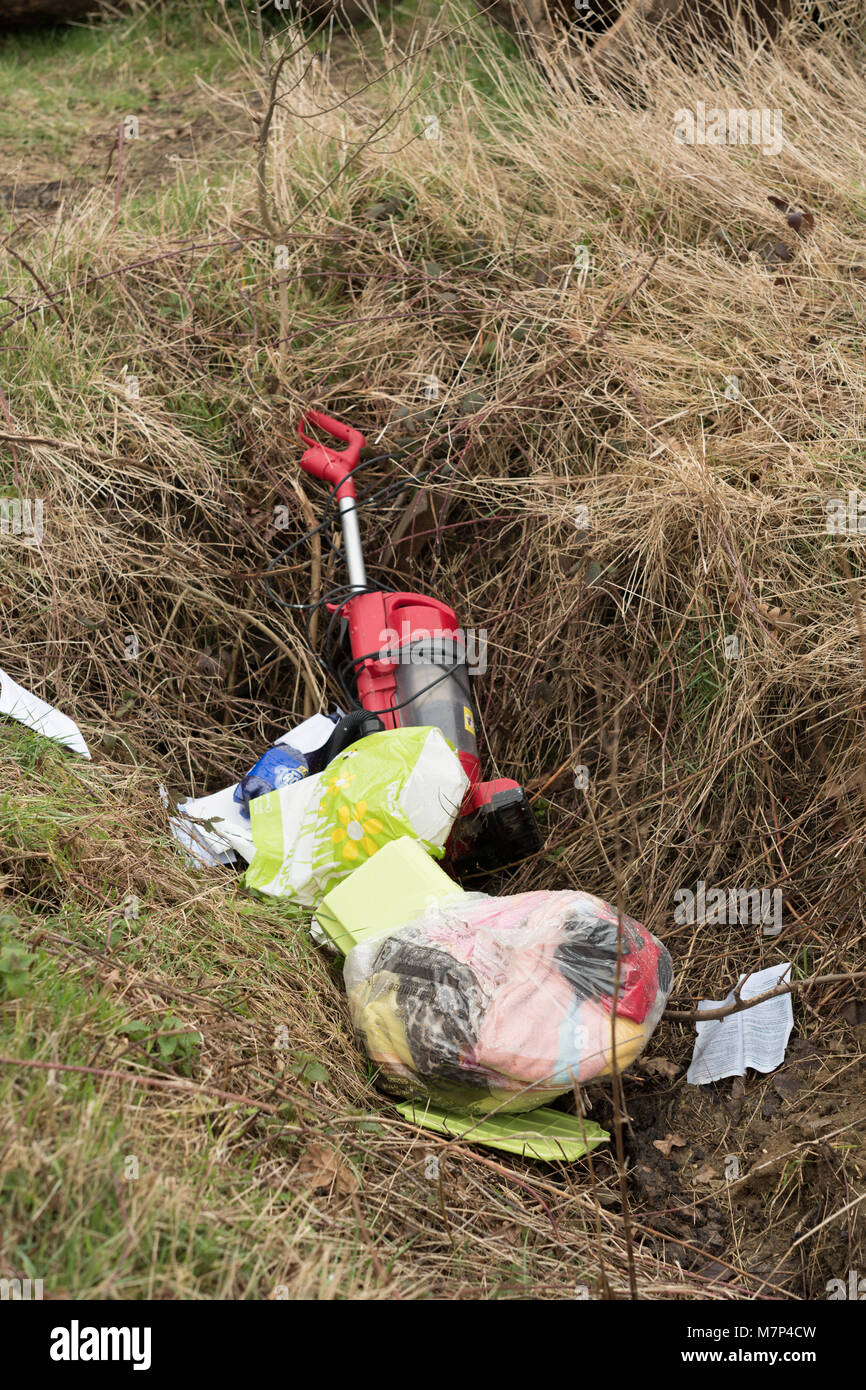 Rubbish in ditch Stock Photo