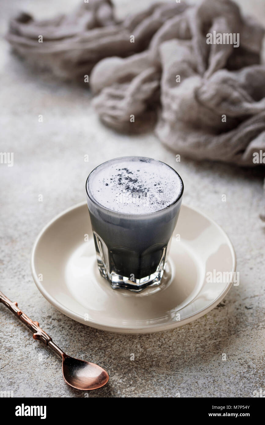 Black charcoal latte. Detox drink Stock Photo Alamy