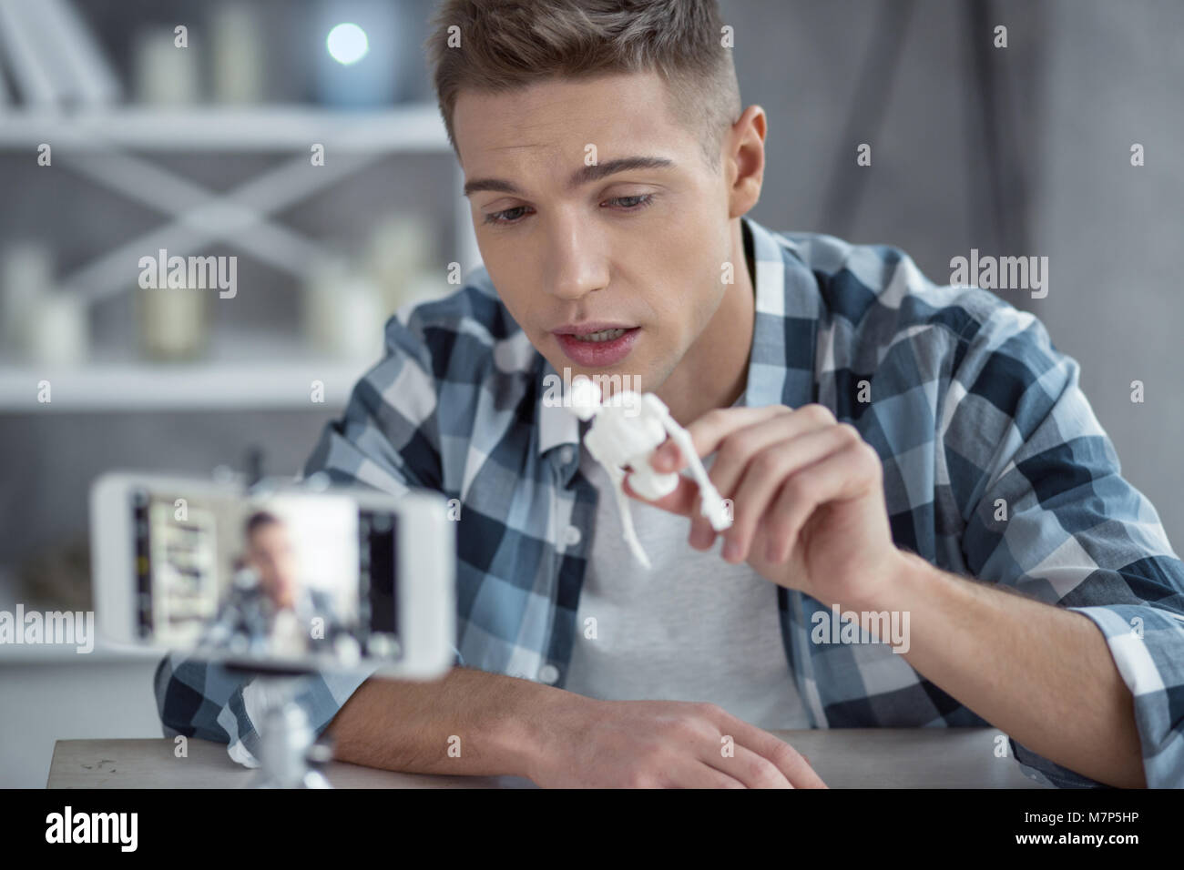 Papular Bloger Concentrated popular blogger making a new video Stock Photo - Alamy