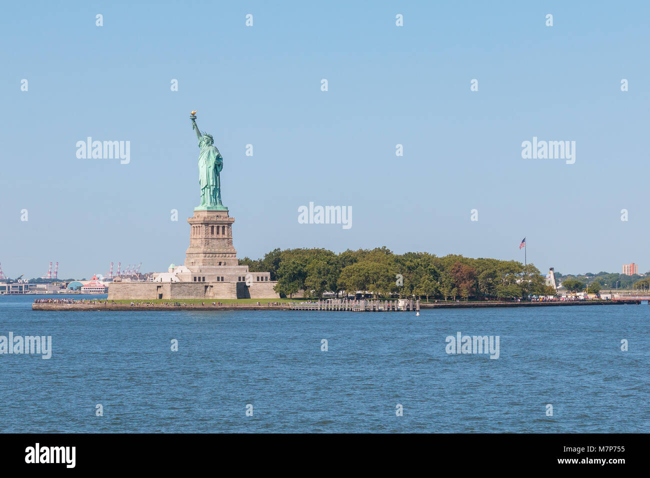 Statue of Liberty and panoramic view of Manhattan City skyline from the